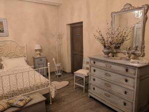 Postel nebo postele na pokoji v ubytování B&B Col di Piagge