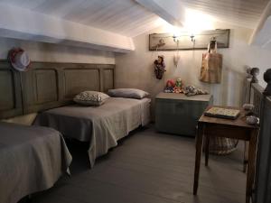 Postel nebo postele na pokoji v ubytování B&B Col di Piagge