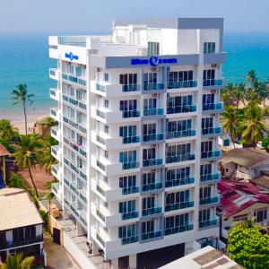 an aerial view of a building with the ocean in the background at Sea view A in Mount Lavinia