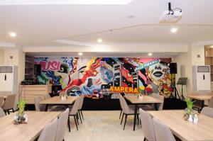 Un restaurante o sitio para comer en Graha SUMSEL