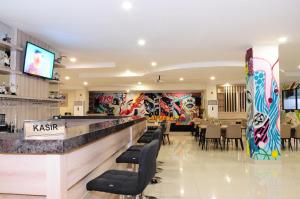 Una televisión o centro de entretenimiento en Graha SUMSEL