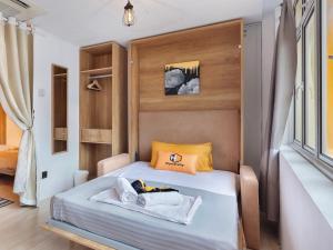 Postel nebo postele na pokoji v ubytování hipstercity hostel