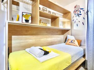 Postel nebo postele na pokoji v ubytování hipstercity hostel