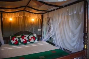Postel nebo postele na pokoji v ubytování Goyambokka Guesthouse