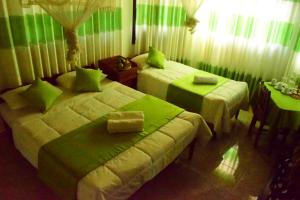 Cama o camas de una habitación en Kandy Holiday Home