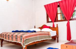 Letto o letti in una camera di Kandy View Hotel