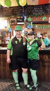 two men are standing in front of a bar at Boorowa Hotel in Boorowa