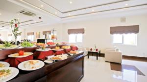 En restaurant eller et andet spisested på Ban Thach Riverside Hotel & Resort