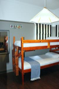 Katil atau katil-katil dalam bilik di Garden Route Stay