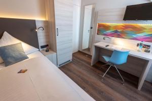 Postel nebo postele na pokoji v ubytování Westend Hotel (non-smoking)
