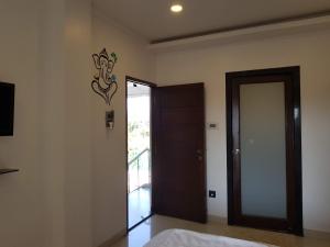 Voodi või voodid majutusasutuse Athi Resorts toas