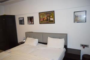 Voodi või voodid majutusasutuse Athi Resorts toas