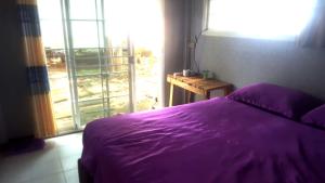 Postel nebo postele na pokoji v ubytování Kohchang 7 seaview bungalow