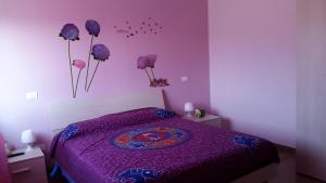 Postel nebo postele na pokoji v ubytování b&b L'Aquila del Parco