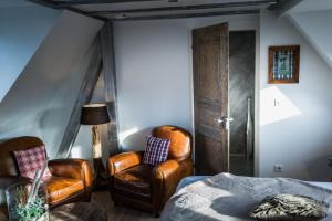 Postel nebo postele na pokoji v ubytování Auberge au Boeuf