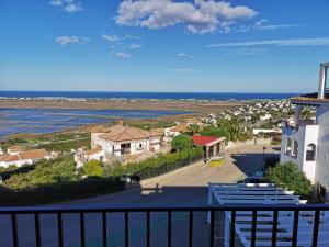 a view of the ocean from a balcony of a house at Casa Lina Belavista in Pego