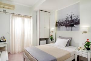 Postel nebo postele na pokoji v ubytování Hotel Ideon