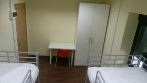 A bed or beds in a room at El cordal de laciana