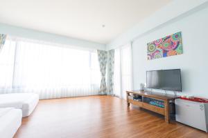 TV o dispositivi per l'intrattenimento presso 5+1 Homestay