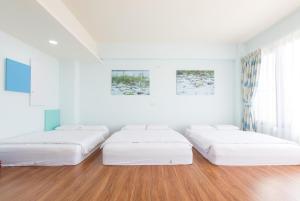 Letto o letti in una camera di 5+1 Homestay