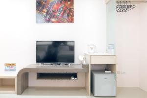 TV o dispositivi per l'intrattenimento presso 5+1 Homestay