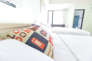 Letto o letti in una camera di 5+1 Homestay