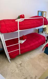 A bed or beds in a room at Royal Guest House Venice