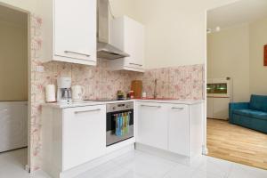 Kuchyňa alebo kuchynka v ubytovaní Apartament Garncarska