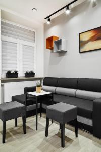 Ruang duduk di Compact Studios Słowackiego Avenue