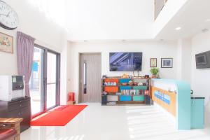 TV o dispositivi per l'intrattenimento presso 5+1 Homestay