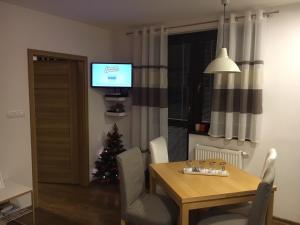 A television and/or entertainment centre at Apartment Primulka