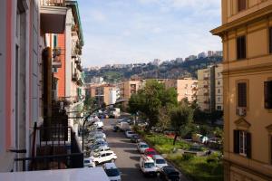 a view of a city street with parked cars at B&B Sosta Flegrea in Naples