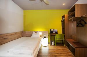 Postel nebo postele na pokoji v ubytování Basic Hotel Innsbruck