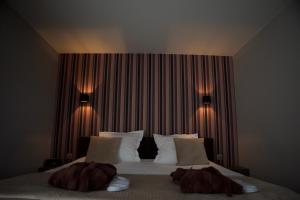 Postel nebo postele na pokoji v ubytování B&B Maison Kerkhove