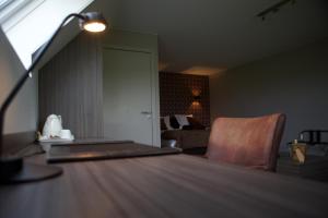 Posezení v ubytování B&B Maison Kerkhove