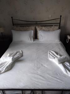 Postel nebo postele na pokoji v ubytování Elafos Hotel
