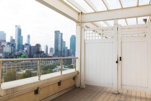 a balcony with a view of the city at Romana Hotel - NYC in Queens