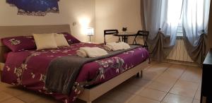 Postel nebo postele na pokoji v ubytování B&B Pierilu'