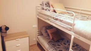 Łóżko lub łóżka w pokoju w obiekcie L'Avi Pep