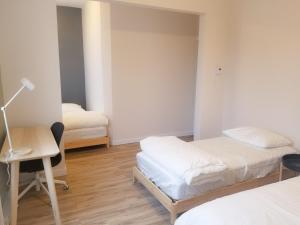 Postel nebo postele na pokoji v ubytování Ottawa Stay Downtown Suites