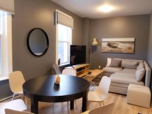 TV a/nebo společenská místnost v ubytování Ottawa Stay Downtown Suites