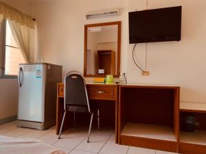 TV a/nebo společenská místnost v ubytování Baansilp Hotel