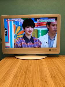 Televiisor ja/või meelelahutuskeskus majutusasutuses Lucy's House横浜中華街 House3