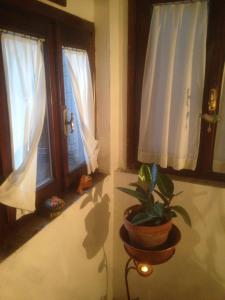 Llit o llits en una habitació de B&B A due passi dal Castello