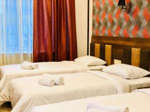Letto o letti in una camera di Hotel Lider Complex