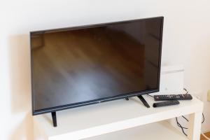 Telewizja i/lub zestaw kina domowego w obiekcie Central Living Apartment 1090 Vienna