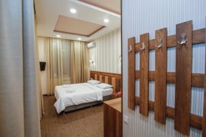 Letto o letti in una camera di Hotel Lider Complex