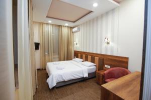 Letto o letti in una camera di Hotel Lider Complex