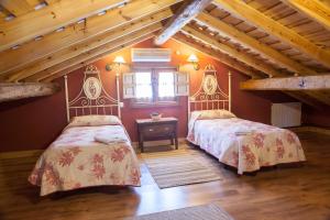 Кровать или кровати в номере Casa Rural El Pilar