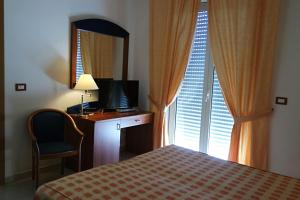 Posteľ alebo postele v izbe v ubytovaní Sait Hotel & BB